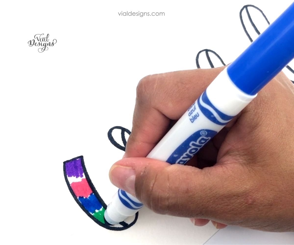 https://www.vialdesigns.com/wp-content/uploads/step-2-start-adding-the-colors_galaxy-lettering-with-crayola-markers-tutorial.jpg